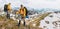 Couple travelers hiking in mountains friends traveling together adventure lifestyle concept