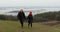 Couple travelers holding hands walk and view on landscape river,