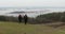 Couple travelers holding hands walk and view on landscape river,