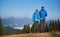 Couple travelers in love walking in the mountains.