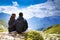Couple of travelers on top of a mountain. Mangart, Julian Alps,