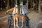 Couple traveling with bicycles in the forest