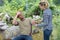 couple traveller drinking water in forest