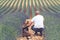 Couple travellers in lavender fields in Provence