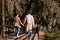 Couple in trench coats holding hands