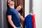 Couple trying clothes in shop changing room