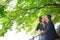 Couple under a chestnut tree