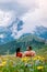 Couple on vacation hiking in the Italien Dolomites, Amazing view on Seceda peak. Trentino Alto Adige, Dolomites Alps