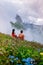 Couple on vacation hiking in the Italien Dolomites, Amazing view on Seceda peak. Trentino Alto Adige, Dolomites Alps