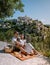 Couple visit the old town of Gordes Provence,Blooming purple lavender fields at Senanque monastery, Provence, southern