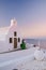 Couple visit Santorini Greece, men and women visit the whitewashed Greek village of Oia