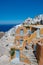 Couple visit Santorini Greece, men and women visit the whitewashed Greek village of Oia