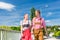 Couple visiting Bavarian fair having fun