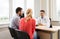 Couple visiting doctor at family planning clinic