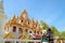 Couple Visiting the Gorgeous Loha Prasat Iron Castle Adorned with 37 Golden Spires inside Wat Ratchanatdaram Temple, Bangkok