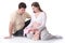 Couple waiting for baby looking on baby clothes