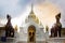 The couple walked to the door of Wat Phra That Hariphunchai. The