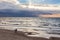 Couple walking along the beach at the polish seaside