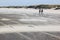 Couple walking on the Ameland Island Beach, Holland