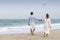 Couple walking on the beach