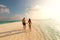 Couple walking on the beach maldive sunset lovely day sand