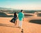 couple walking at the beach of Maspalomas Gran Canaria Spain, men and woman at the sand dunes desert of Maspalomas