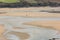 Couple walking dog, Crantock beach, Cornwall