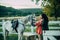 Couple walking with horse on countryside. Love story of young handsome man and beautiful woman walking with their horse