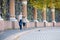 Couple walking in Mikhailovsky garden of Saint-Petersburg