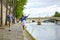 Couple is walking by the Seine