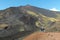 Couple walking on summit Etna Volcano