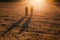 Couple walking at sunset in a Large land