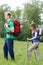 Couple walking with tourist backpacks