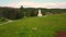 Couple walking toward small white church