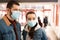 Couple wearing masks in mall. Dangerous virus