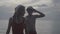 Couple wearing santa hat at the beach