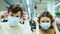 Couple wears mask from coronavirus in mall. Safety life during quarantine.