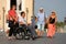 Couple with wheelchair and walking couple