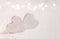 Couple of white wooden hearts. Glitter overlay