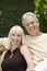 Couple With Wineglass In Garden