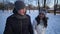 Couple Winter Snow Forest Walking Young Man And Woman Holding Hands In Snowy Park and young woman is offended