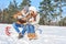 Couple in winter trip having a break