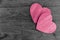 Couple wood hearts pink love on wooden table background