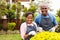 Couple working garden