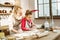 Couple of working women having kitchen covered in flour