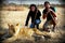 A couple of young adults walk with lions contributing to a local reservation wildlife program close to Victoria Falls