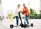 couple young electric scooter city transport riding technology lifestylestreet friend driving modern