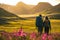 A couple of young hikers with heavy backpacks admiring scenic view of spectacular Icelandic nature. Breathtaking landscape of