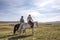 Coupleriding mongolian horses