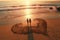 Couples Creating HeartShaped Sand Art on